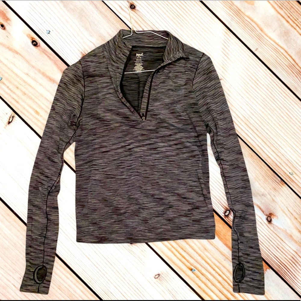 Everlast 1/2 zip-down shirt with thumb holes in sleeve.